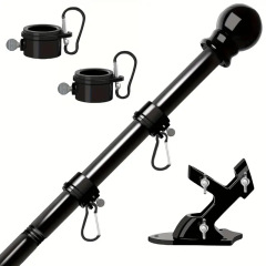 Black sectional stainless steel flag pole with rotating rings, ball finial and angled wall bracket