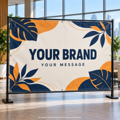 Mockup of a custom blockout vinyl banner with navy and orange branding on an indoor display frame