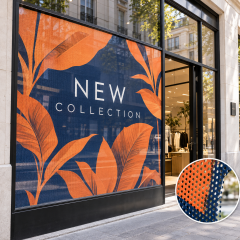 Mockup of custom perforated window graphics on a retail storefront with a new collection design