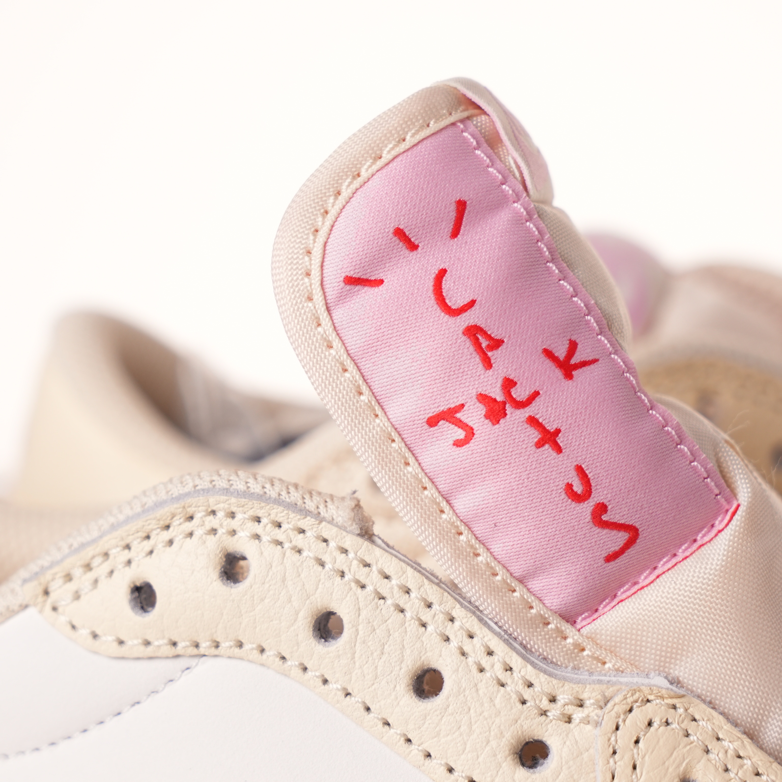 Travis Scott x Air Jordan 1 Low OG Sail Shy Pink