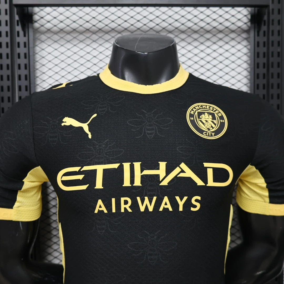 Manchester City away jersey crest detail