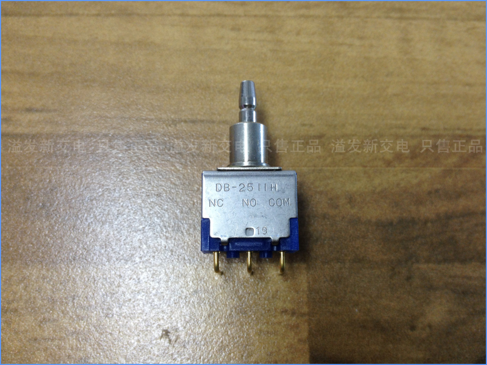 The original Japanese NKK DB-2511H tripod button switch 0.4VA