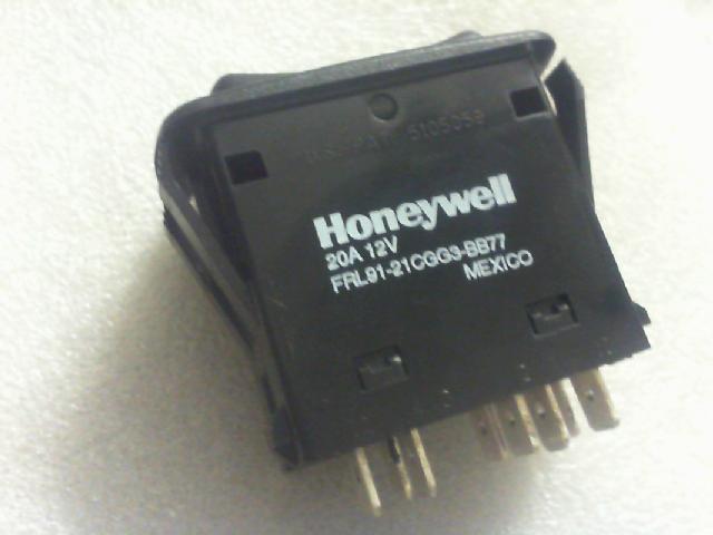 The boat shaped switch. The HOneyweII/PAT5105059 boat shaped switch with light / nine feet above.