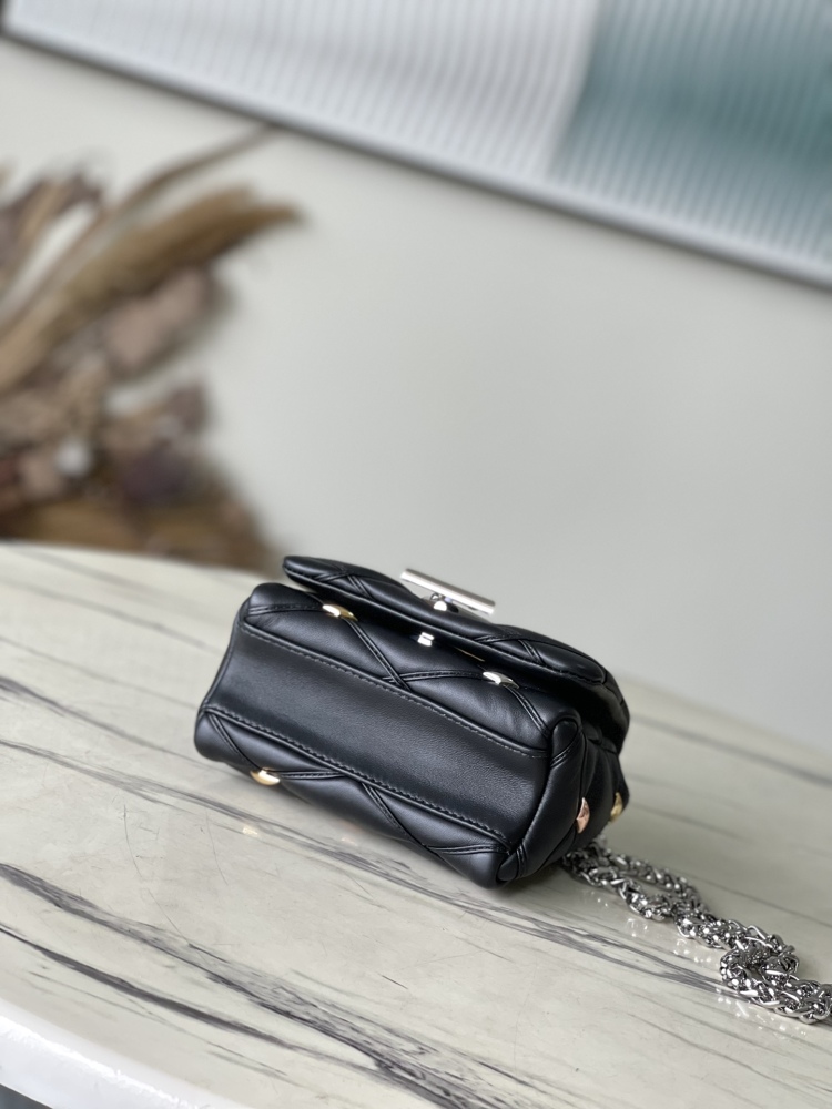 The LV GO-14 (Twist) series Malletage with diamond quilting and studs.