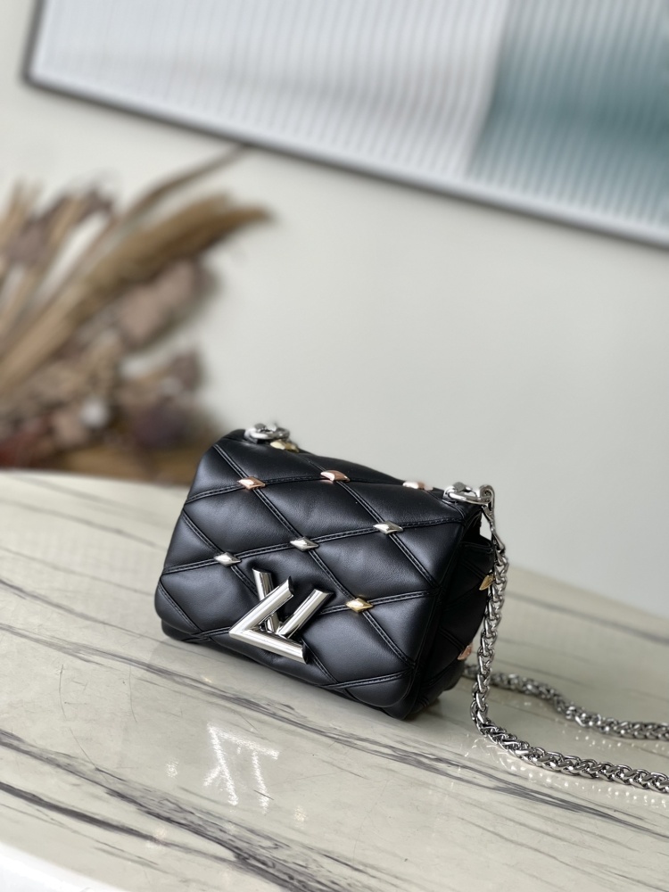 The LV GO-14 (Twist) series Malletage with diamond quilting and studs.