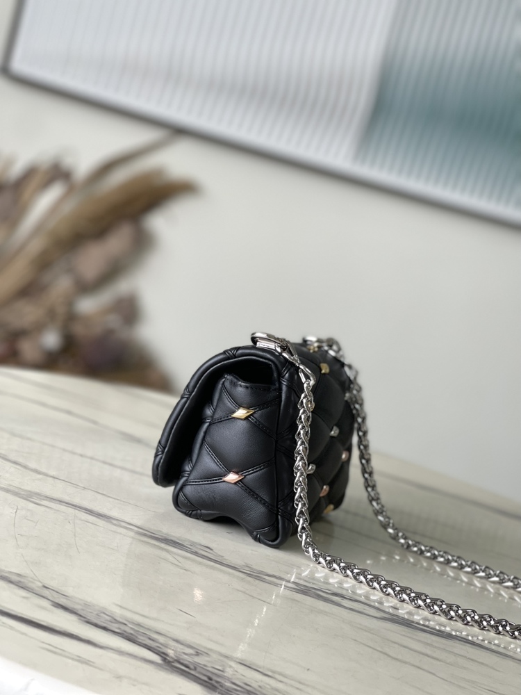 The LV GO-14 (Twist) series Malletage with diamond quilting and studs.