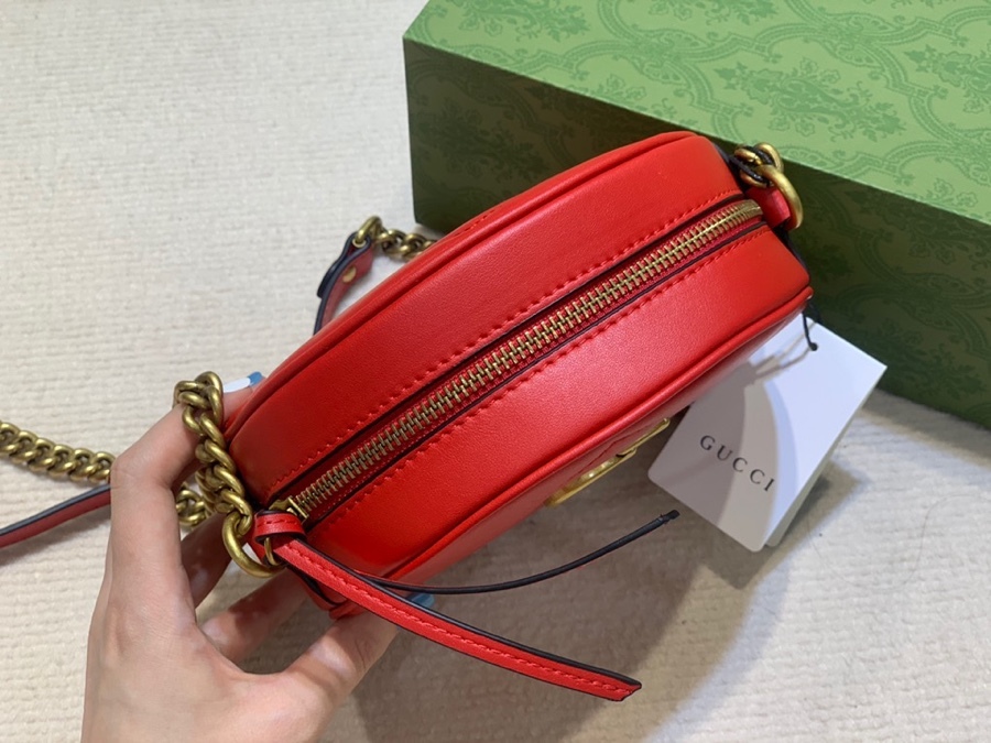 The Gucci GG Marmont round mini crossbody bag is a highly recognizable and popular style within the Marmont collection.