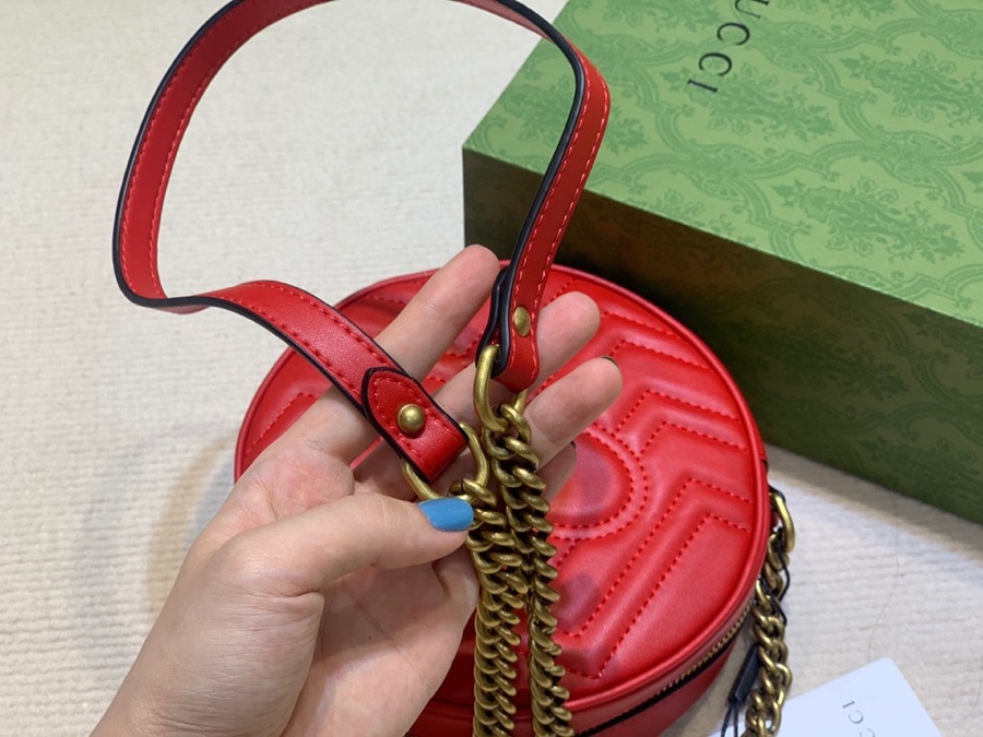The Gucci GG Marmont round mini crossbody bag is a highly recognizable and popular style within the Marmont collection.