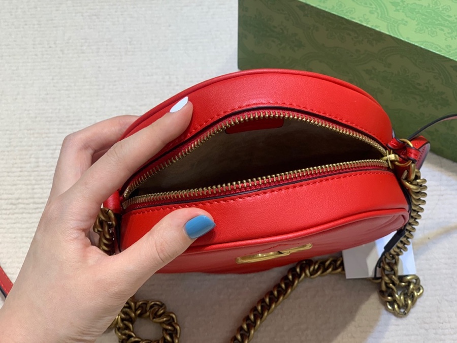 The Gucci GG Marmont round mini crossbody bag is a highly recognizable and popular style within the Marmont collection.
