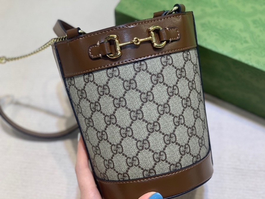 The Gucci Horsebit 1955 mini bucket bag is a popular style in the 1955 collection, combining retro charm with a playful touch.