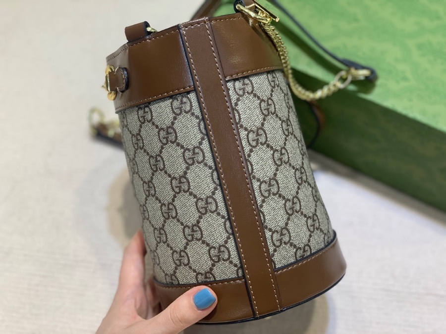 The Gucci Horsebit 1955 mini bucket bag is a popular style in the 1955 collection, combining retro charm with a playful touch.