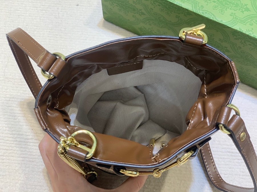 The Gucci Horsebit 1955 mini bucket bag is a popular style in the 1955 collection, combining retro charm with a playful touch.