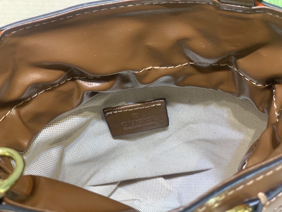 The Gucci Horsebit 1955 mini bucket bag is a popular style in the 1955 collection, combining retro charm with a playful touch.