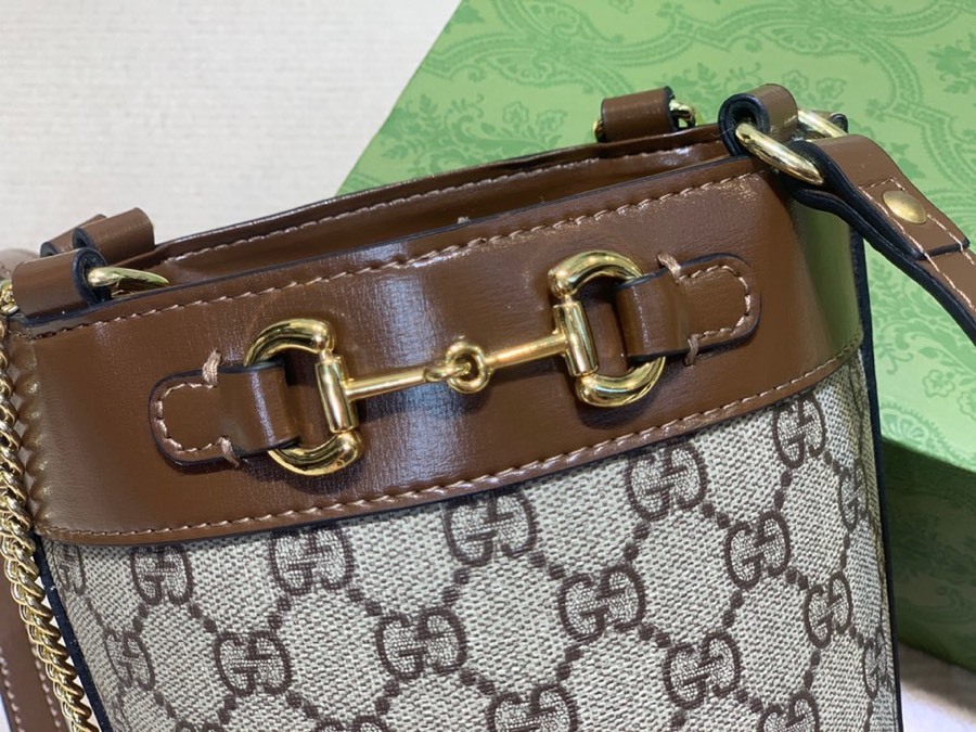 The Gucci Horsebit 1955 mini bucket bag is a popular style in the 1955 collection, combining retro charm with a playful touch.