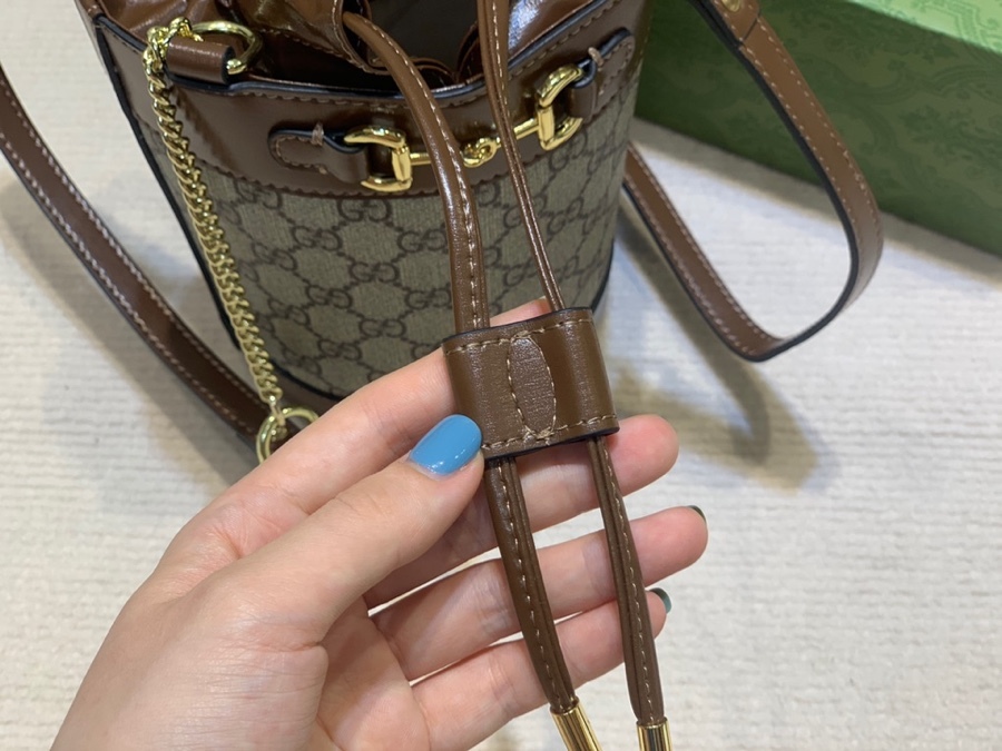 The Gucci Horsebit 1955 mini bucket bag is a popular style in the 1955 collection, combining retro charm with a playful touch.