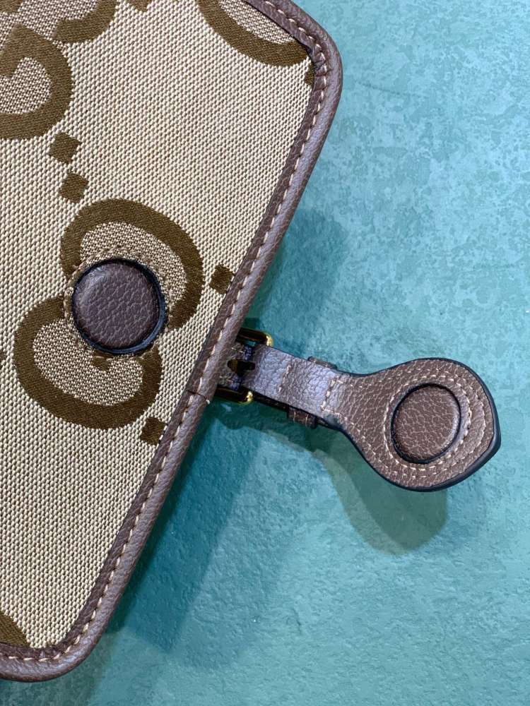 The Gucci Horsebit 1955 series oversized GG monogram saddle bag is a highly recognizable and popular style from the 1955 collection.