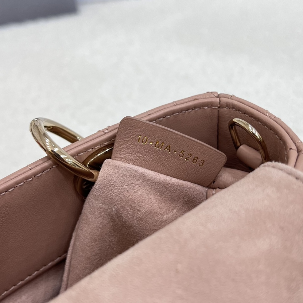 The Dior Lady D-Joy super mini version (horizontal Lady Dior), also known as the "horizontal Lady Dior bag".