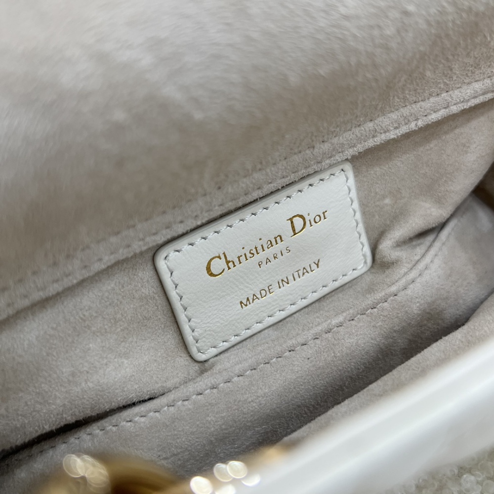 The Dior Lady D-Joy super mini version (horizontal Lady Dior), also known as the "horizontal Lady Dior bag".