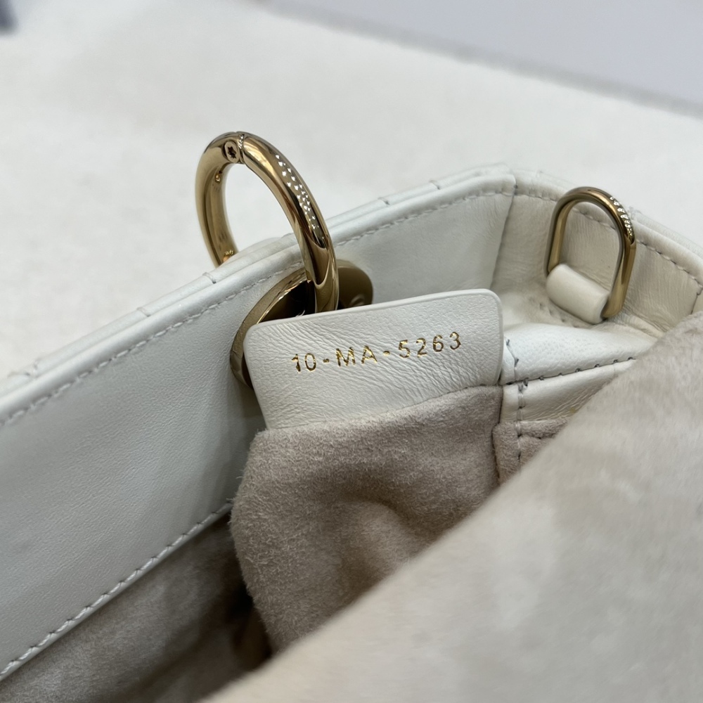 The Dior Lady D-Joy super mini version (horizontal Lady Dior), also known as the "horizontal Lady Dior bag".