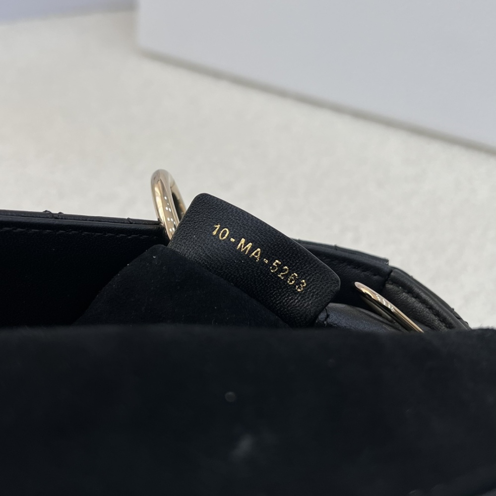 The Dior Lady D-Joy super mini version (horizontal Lady Dior), also known as the "horizontal Lady Dior bag".