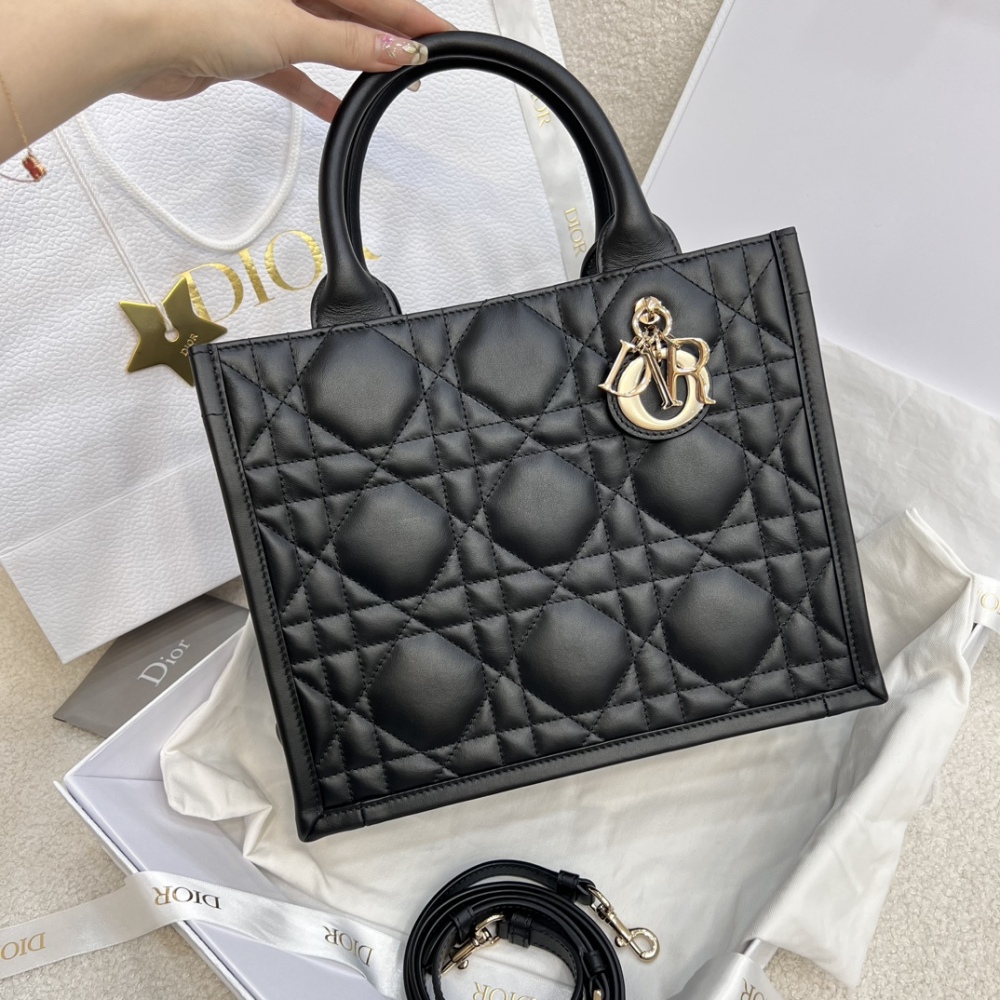 The medium-sized Dior Book Tote in quilted, also known as the "Dior quilted tote bag," is a leather upgrade of the classic Book Tote.