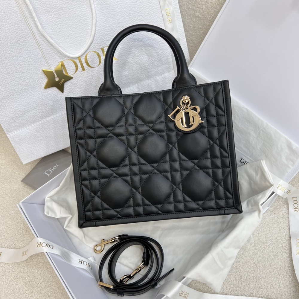 The medium-sized Dior Book Tote in quilted, also known as the "Dior quilted tote bag," is a leather upgrade of the classic Book Tote.
