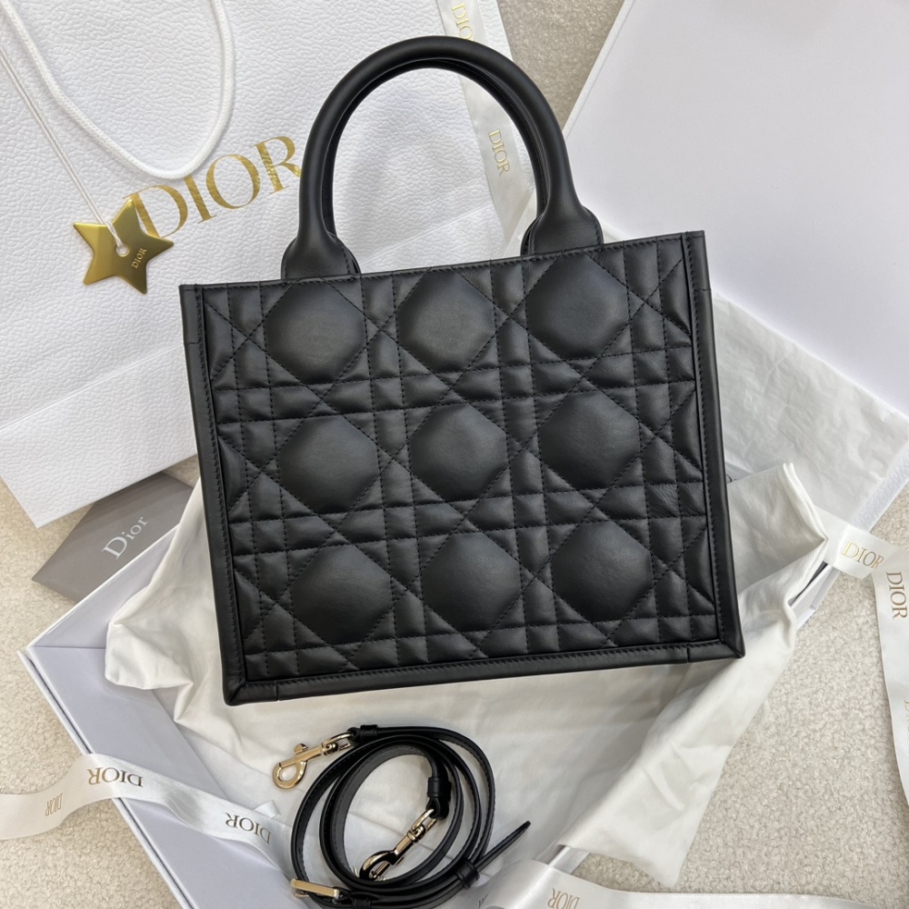 The medium-sized Dior Book Tote in quilted, also known as the "Dior quilted tote bag," is a leather upgrade of the classic Book Tote.