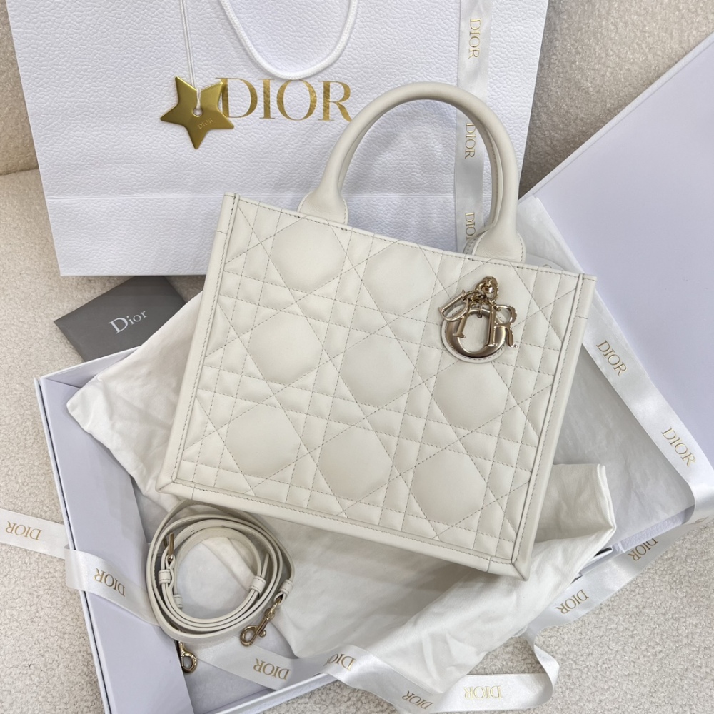 The medium-sized Dior Book Tote in quilted, also known as the "Dior quilted tote bag," is a leather upgrade of the classic Book Tote.