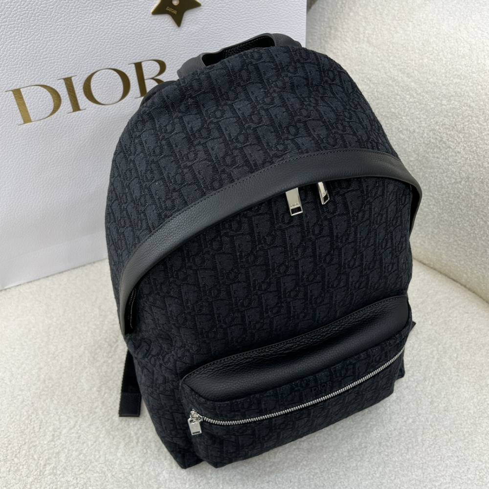 The Dior Rider Oblique all-black monogram backpack is also often referred to as the Dior men's/unisex monogram backpack.