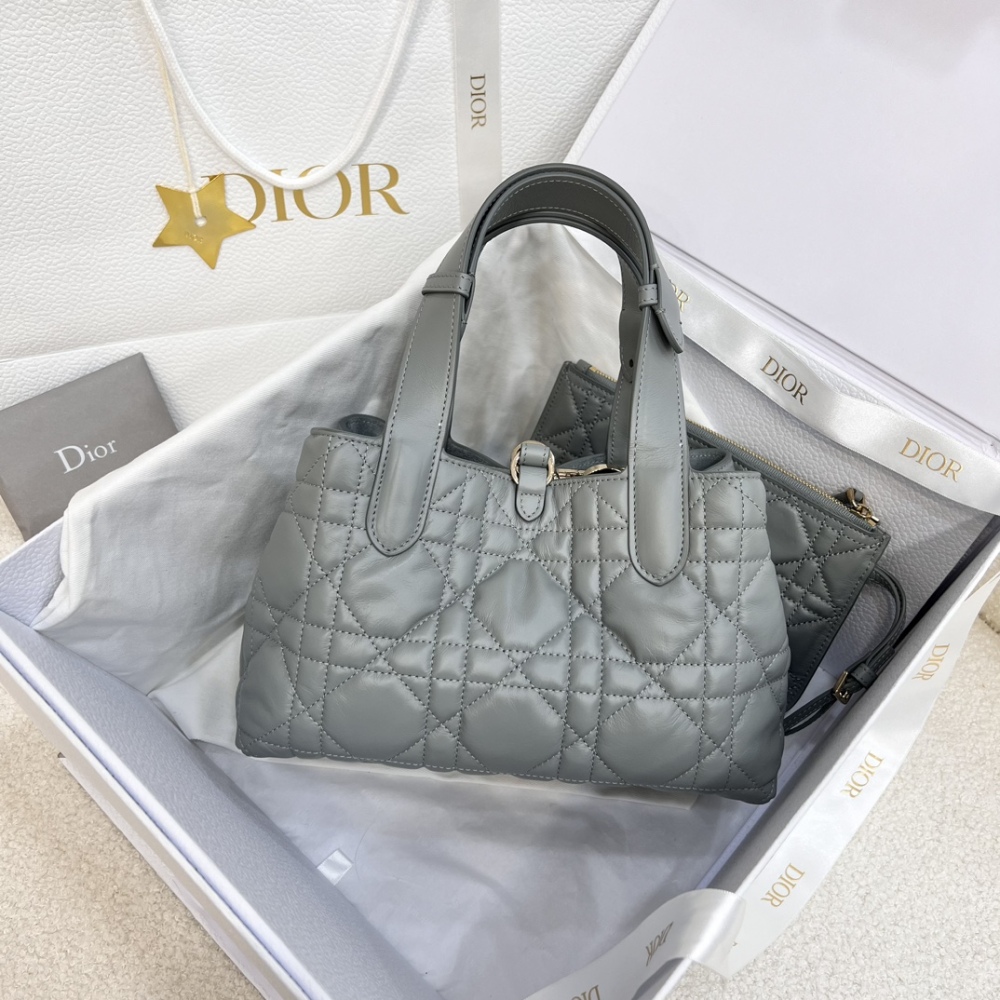 The Dior Toujours small cannage tote bag, affectionately known as the "softer version of the Princess Diana tote," is a popular and gentle workwear style in recent years.