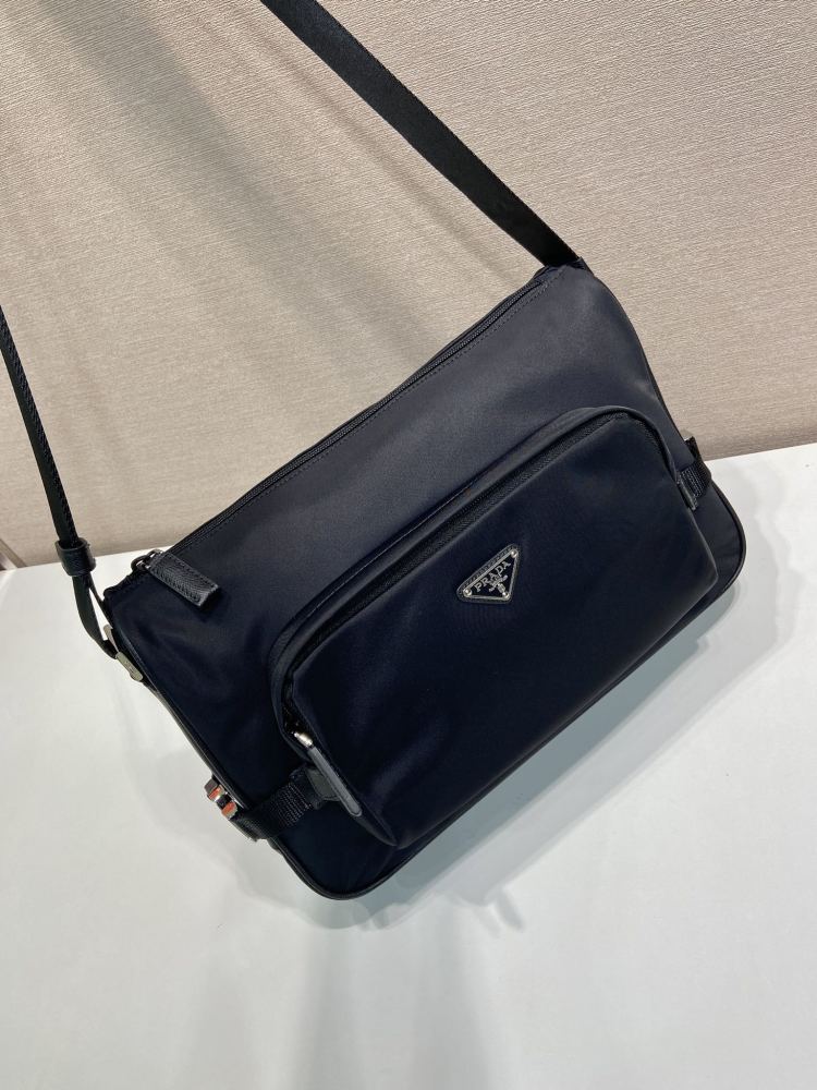 The Prada Re-Nylon messenger bag is also a very popular unisex crossbody bag from Prada in recent years.