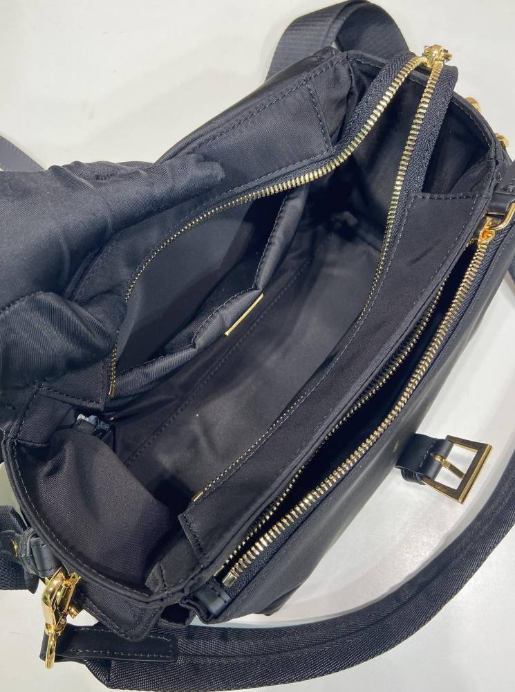 The Prada Re-Nylon flap messenger bag is also a very popular unisex crossbody bag from Prada in recent years.