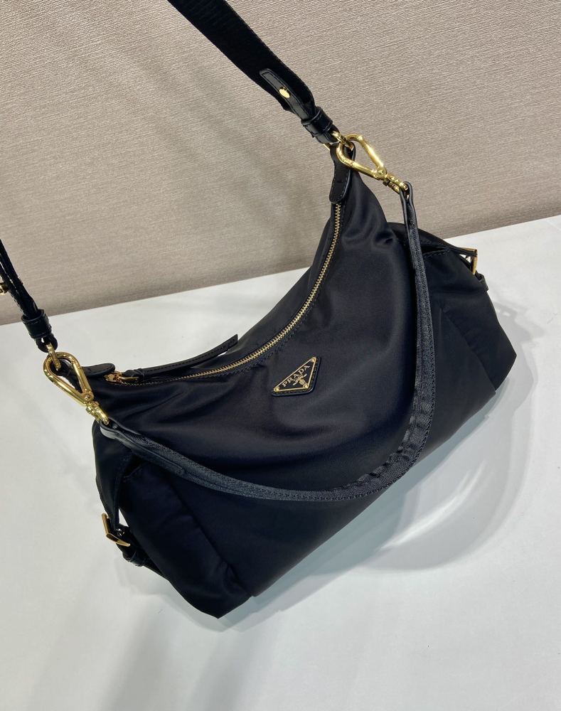 The Prada Re-Nylon Hobo shoulder bag (large/commuter style) is a very popular and practical large bag in recent years.