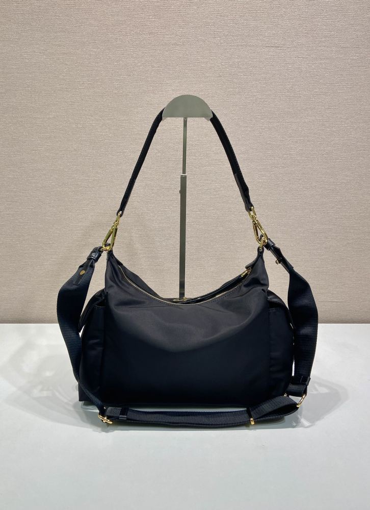 The Prada Re-Nylon Hobo shoulder bag (large/commuter style) is a very popular and practical large bag in recent years.