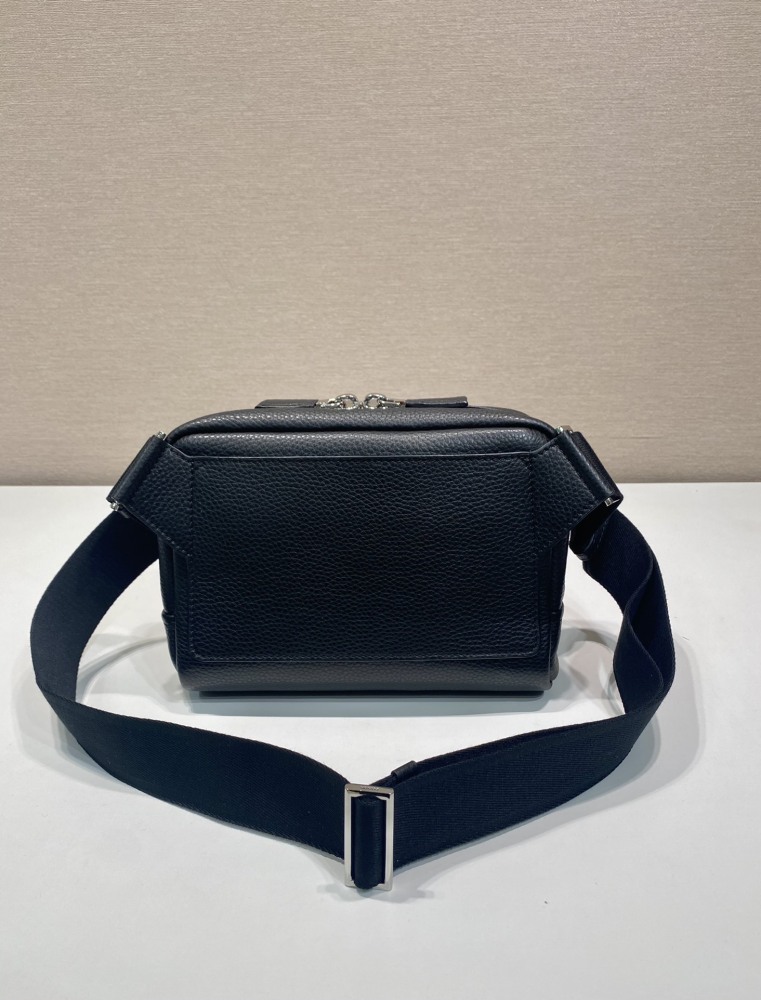 Prada's classic pebbled leather camera bag is the brand's signature unisex crossbody bag.