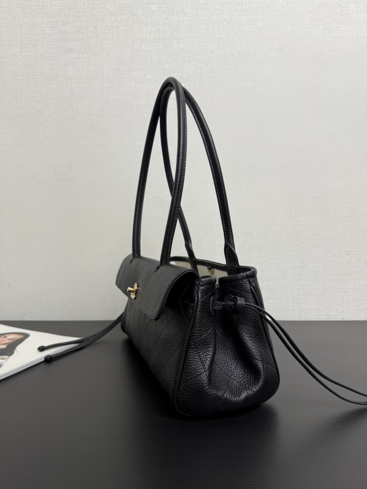 The Chanel caviar leather horizontal long-handled tote bag is a popular commuter style from the Vintage Chanel collection, also known as the "baguette tote".