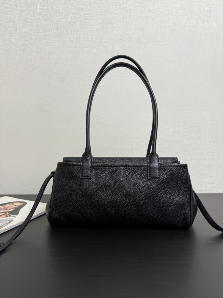 The Chanel caviar leather horizontal long-handled tote bag is a popular commuter style from the Vintage Chanel collection, also known as the "baguette tote".