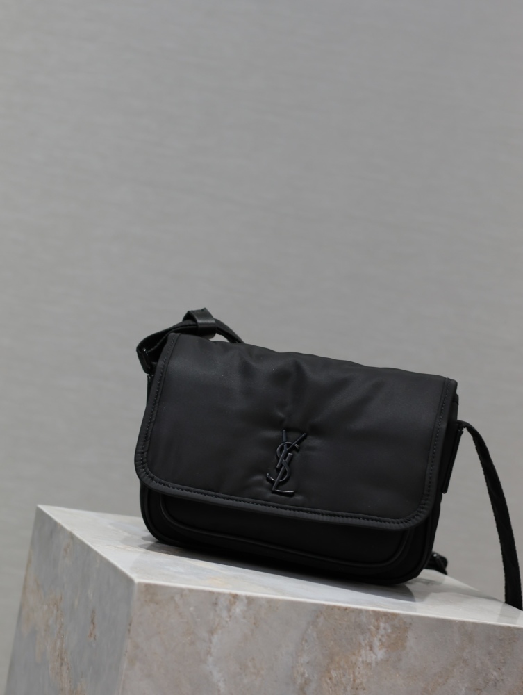 The YSL Saint Laurent Niki small nylon messenger bag is one of the brand's iconic "dark style" favorites.