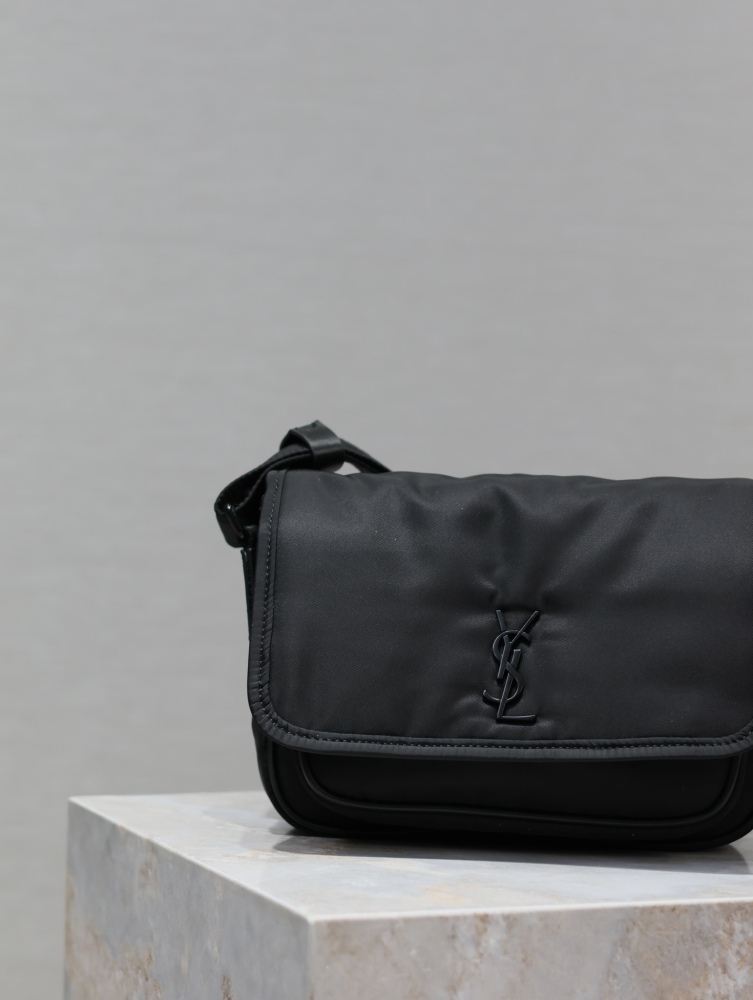 The YSL Saint Laurent Niki small nylon messenger bag is one of the brand's iconic "dark style" favorites.
