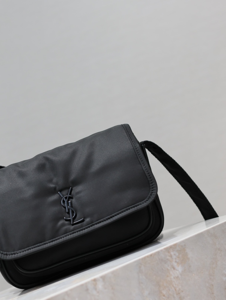 The YSL Saint Laurent Niki small nylon messenger bag is one of the brand's iconic "dark style" favorites.