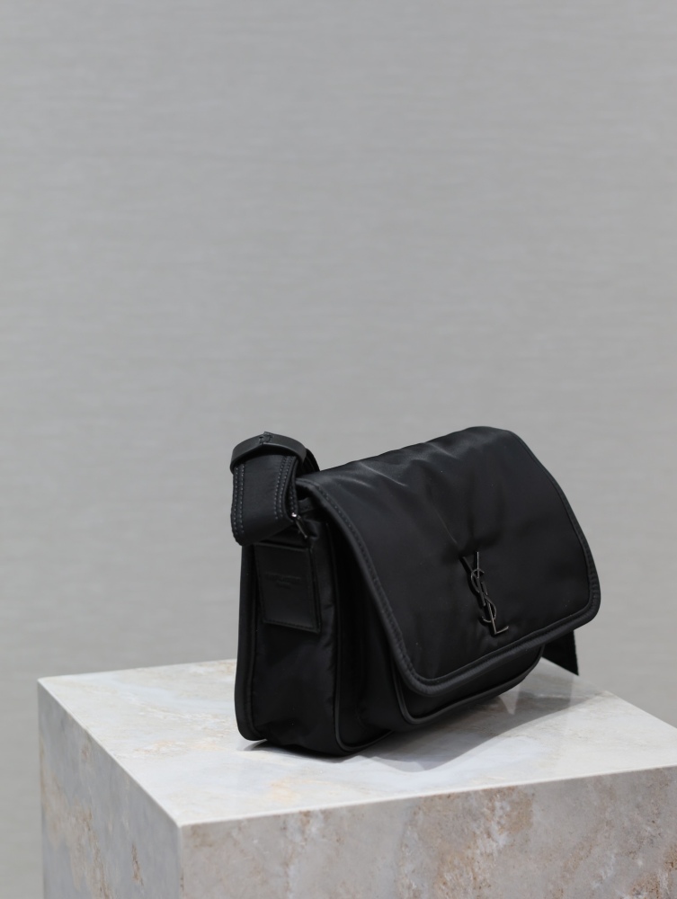 The YSL Saint Laurent Niki small nylon messenger bag is one of the brand's iconic "dark style" favorites.