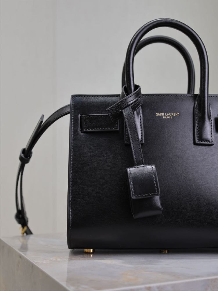 The YSL Saint Laurent Baby Sac De Jour mini bag, also known as the "accordion bag," is the brand's iconic entry-level commuter style.