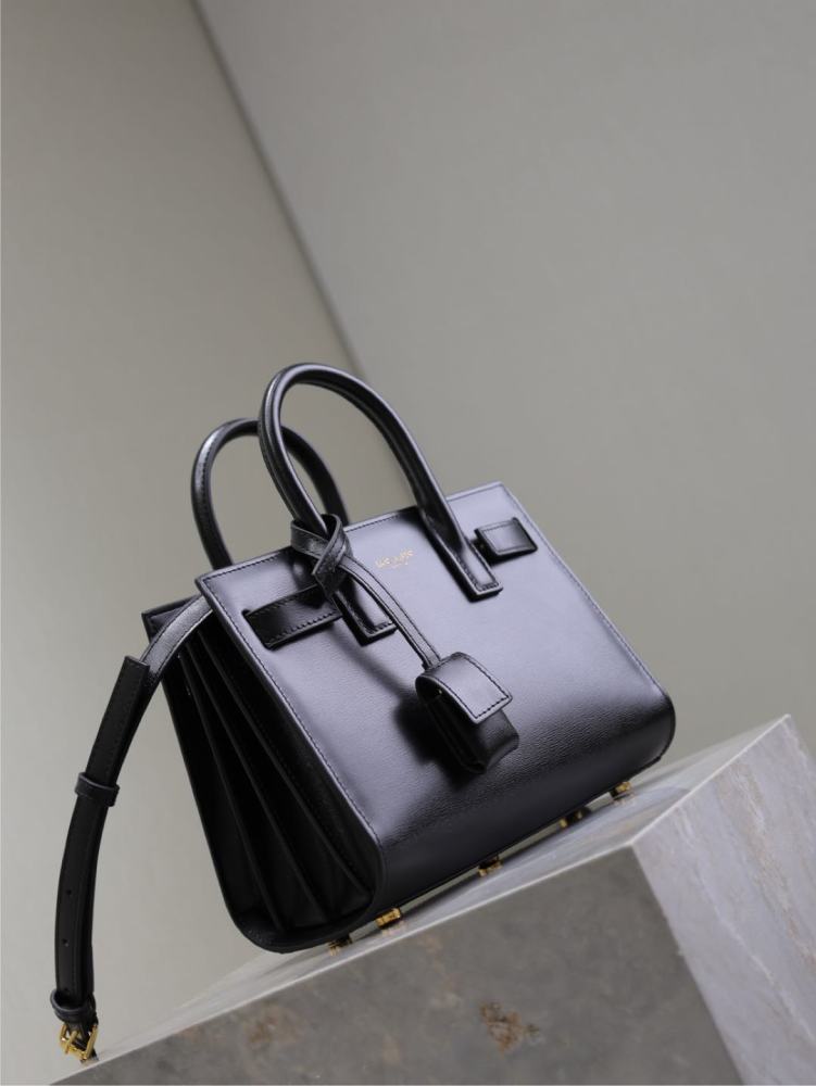 The YSL Saint Laurent Baby Sac De Jour mini bag, also known as the "accordion bag," is the brand's iconic entry-level commuter style.