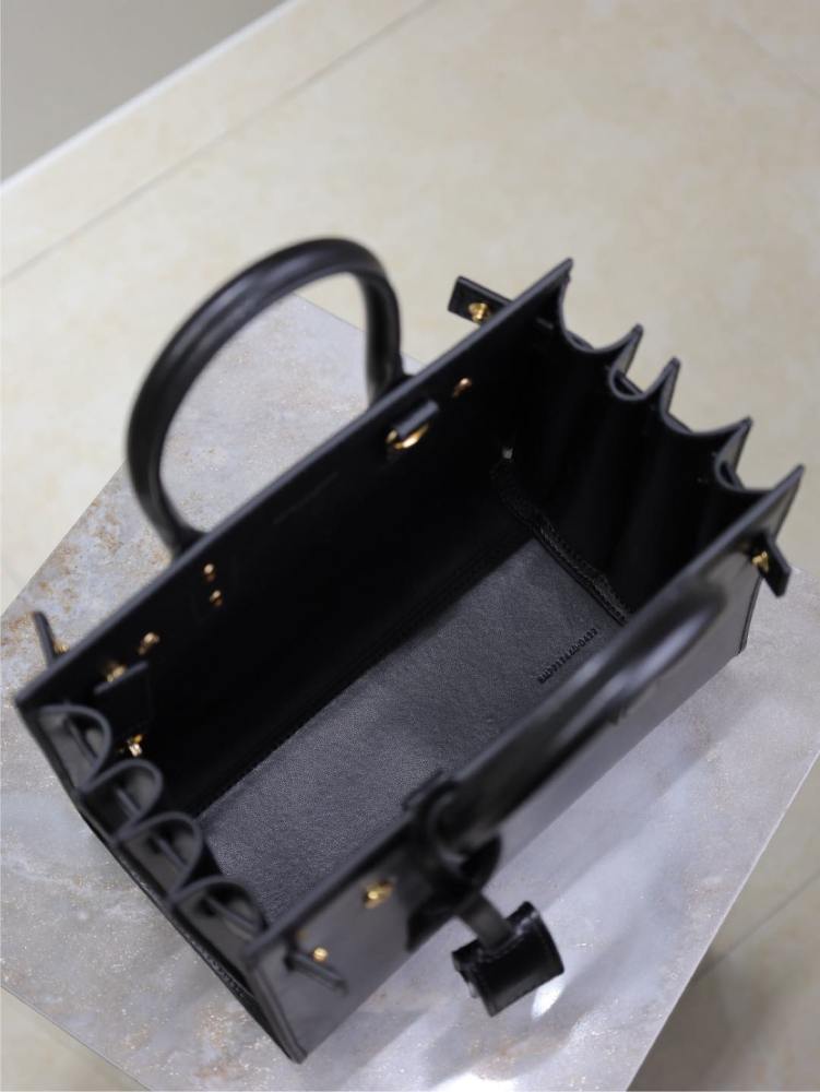 The YSL Saint Laurent Baby Sac De Jour mini bag, also known as the "accordion bag," is the brand's iconic entry-level commuter style.