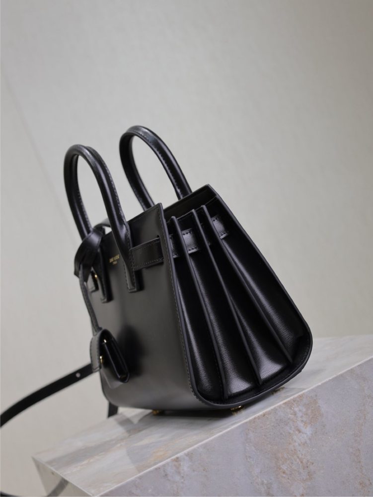 The YSL Saint Laurent Baby Sac De Jour mini bag, also known as the "accordion bag," is the brand's iconic entry-level commuter style.