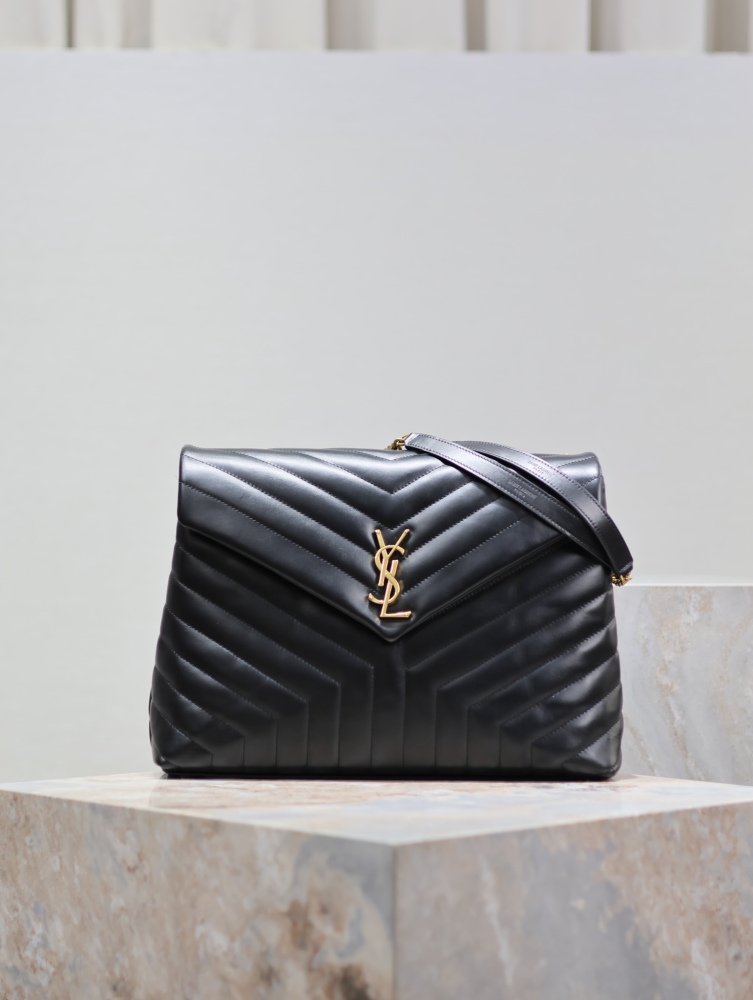 The YSL Saint Laurent LouLou large quilted tote bag, also known as the "envelope tote," is a signature and popular commuter style from the brand.