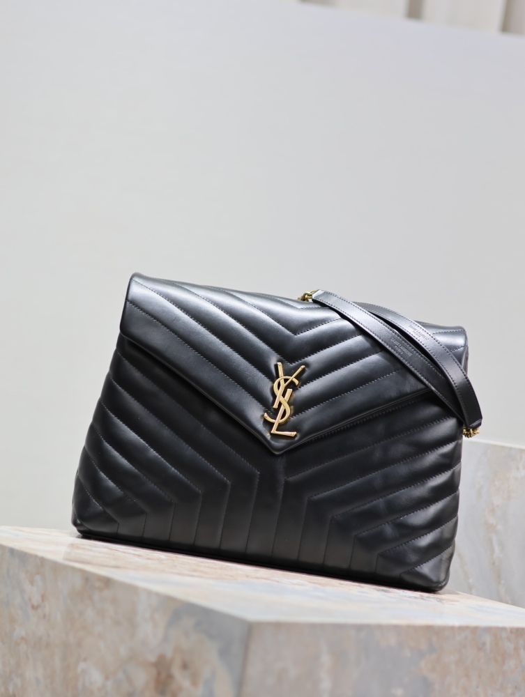 The YSL Saint Laurent LouLou large quilted tote bag, also known as the "envelope tote," is a signature and popular commuter style from the brand.