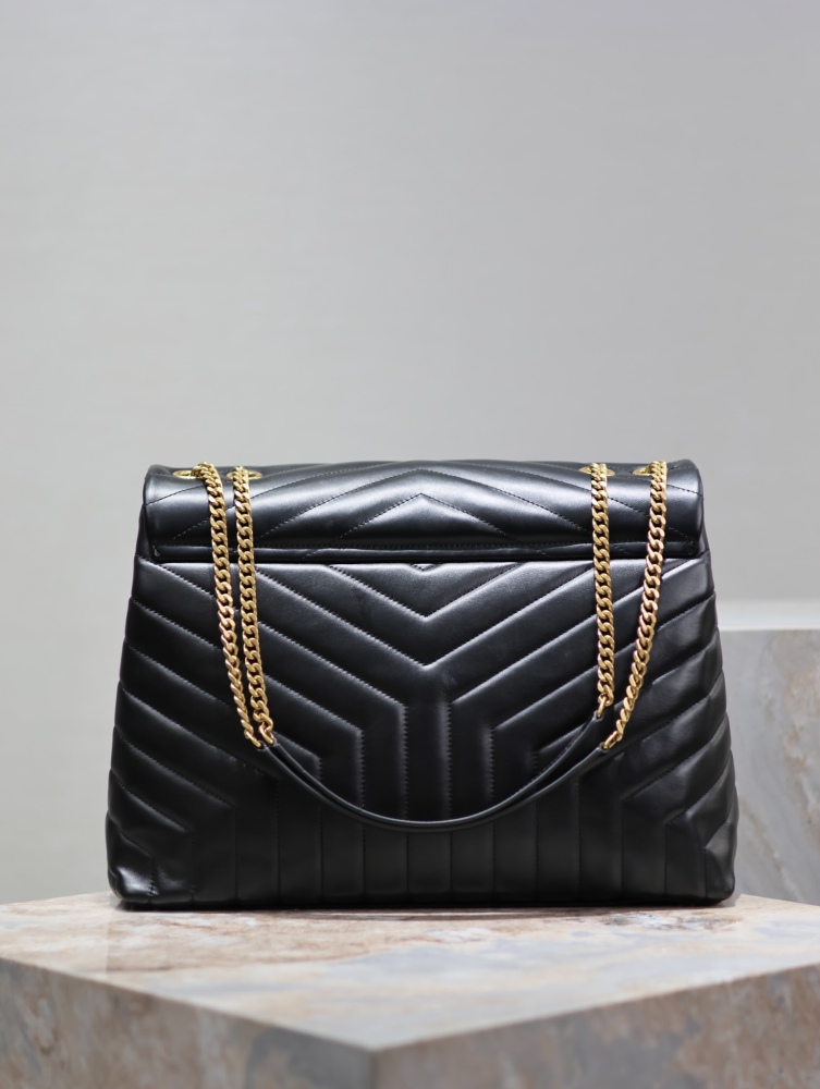 The YSL Saint Laurent LouLou large quilted tote bag, also known as the "envelope tote," is a signature and popular commuter style from the brand.