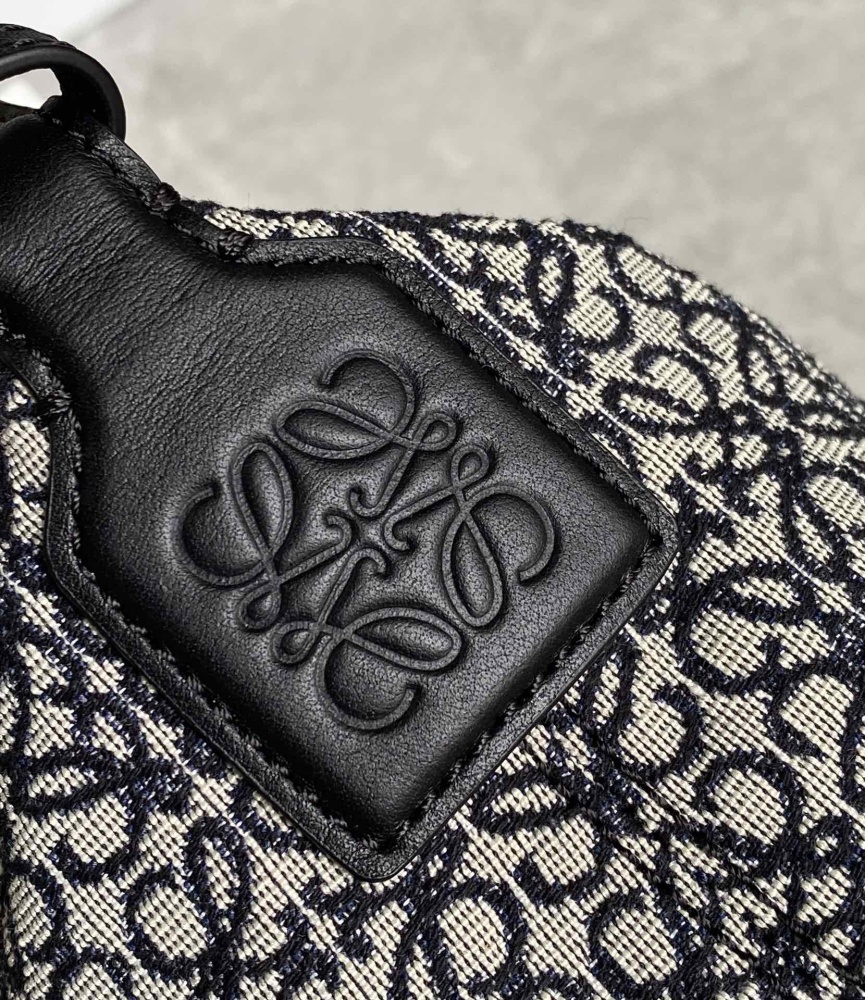 The LOEWE Cubi Small Anagram Jacquard Canvas Shoulder Bag (Navy Blue)—also commonly referred to as one of the "Lunchbox Bag" series.