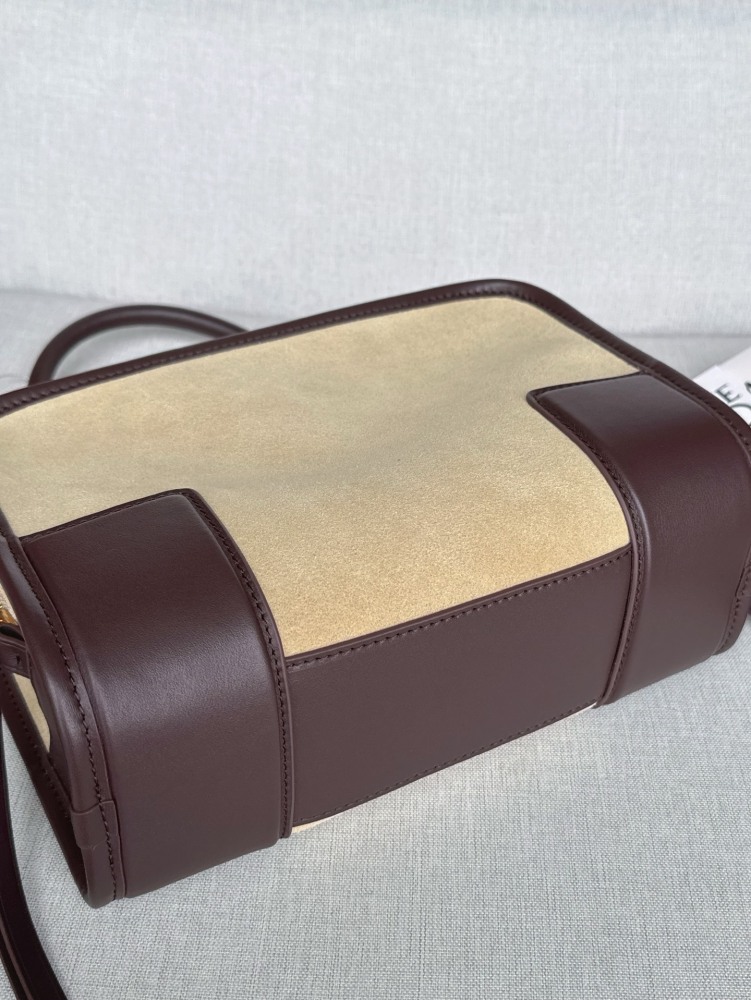 The LOEWE Small Suede Amazona 180 Handbag (Sand / Chocolate Brown) is a new release paying homage to the brand's iconic Amazona series, and has emerged as one of LOEWE's most popular commuter bags in recent years.